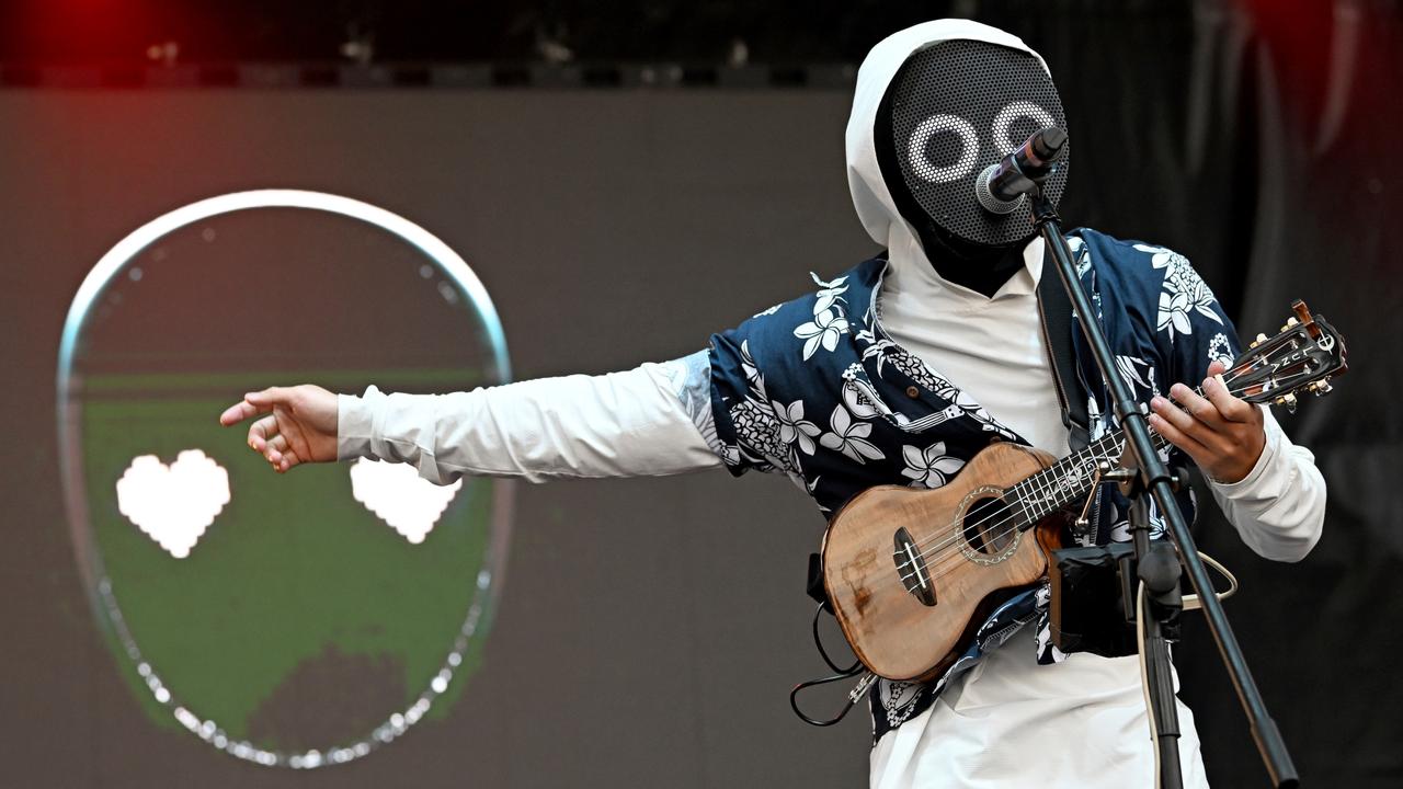 A spooky mask makes him a rock star. Here's why he takes it off