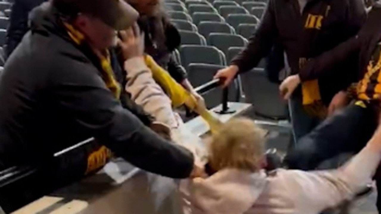 Footy Fight Erupts at MCG: Ugly Brawl Leaves Fans Injured After Hawks Loss