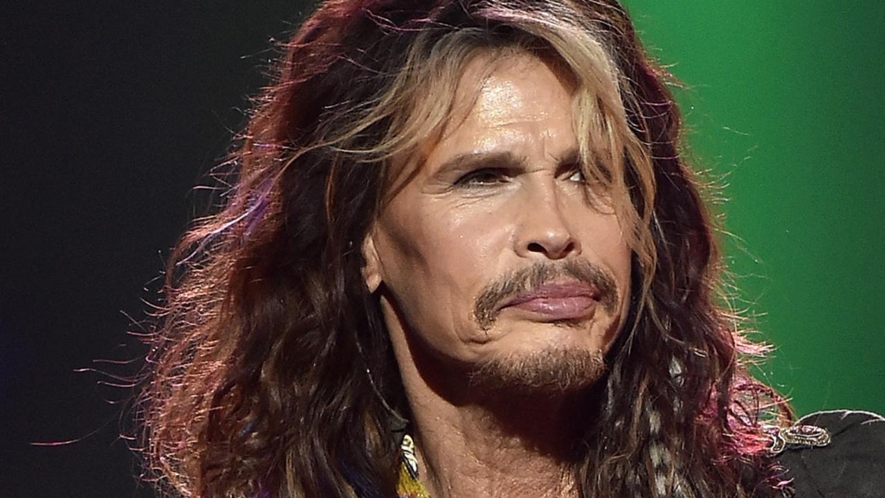 Unveiling the Mystery Behind Steven Tyler's Iconic Microphone Scarves