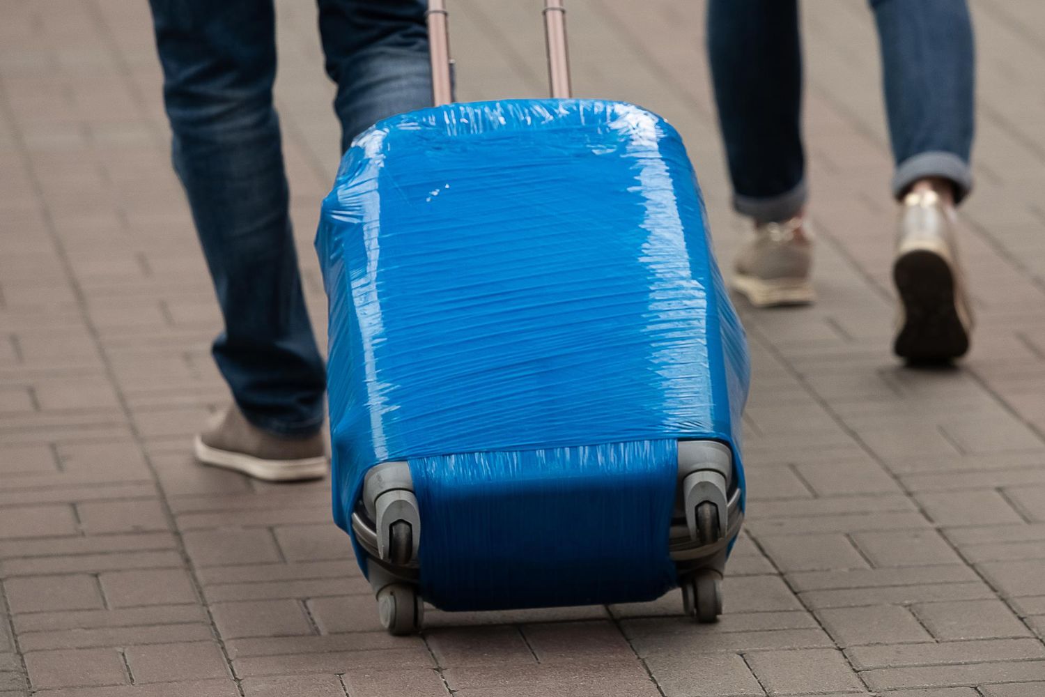 Why Are People Still Wrap-Wrapping Their Luggage at the Airport?! A Travel Mystery