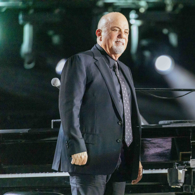 Billy Joel was still dating Elle Macpherson when he met Christie Brinkley