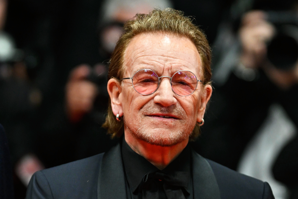 Bono Brings the House Down at Cannes: 7-Minute Standing O for 'Stories of Surrender' Doc